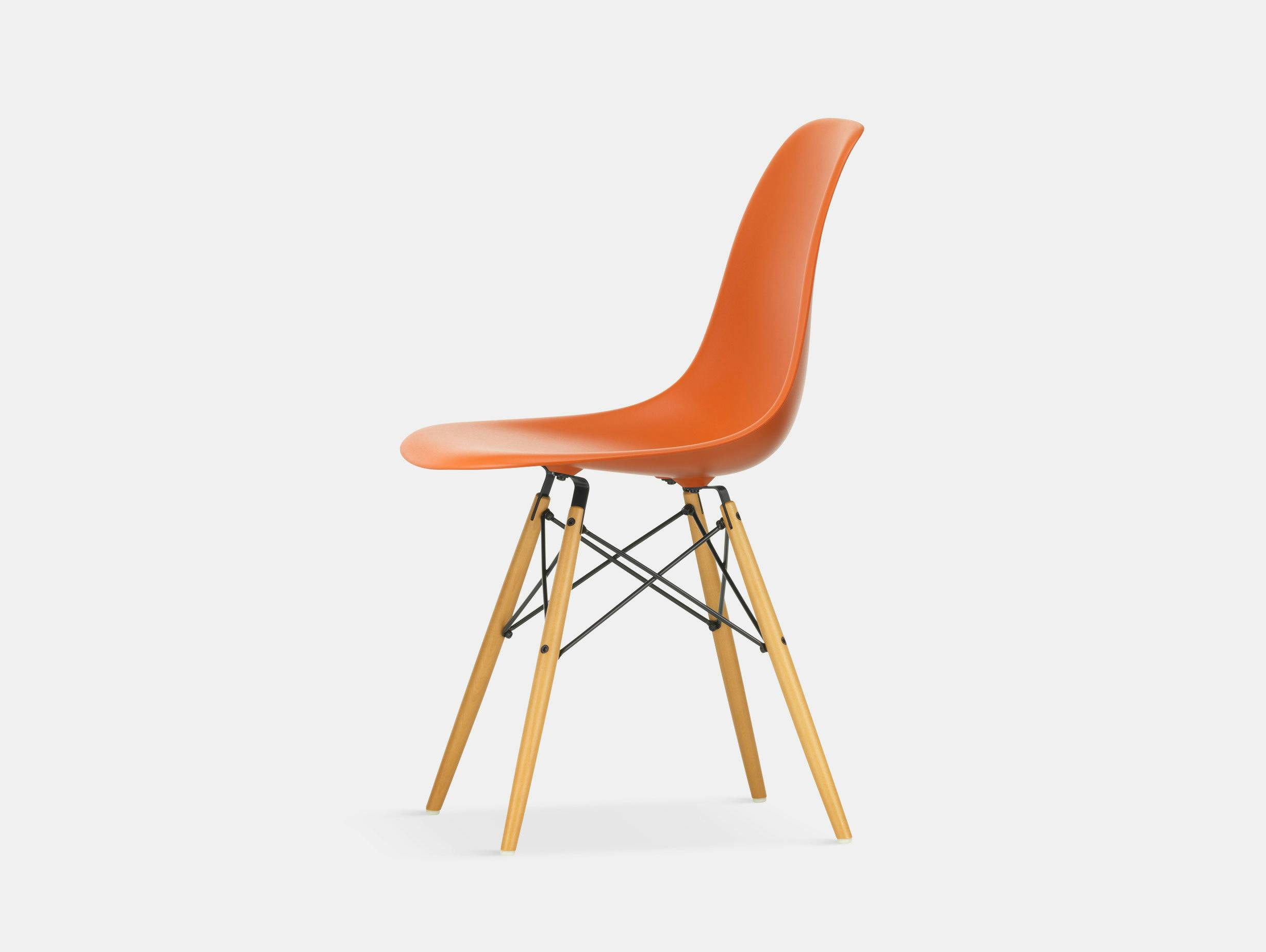 Vitra Eames DSW Plastic Side Chair rusty orange golden maple legs